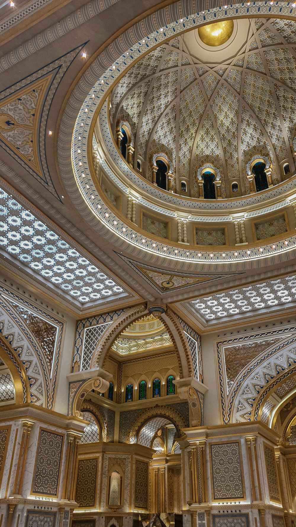 a large ornate ceiling with statues