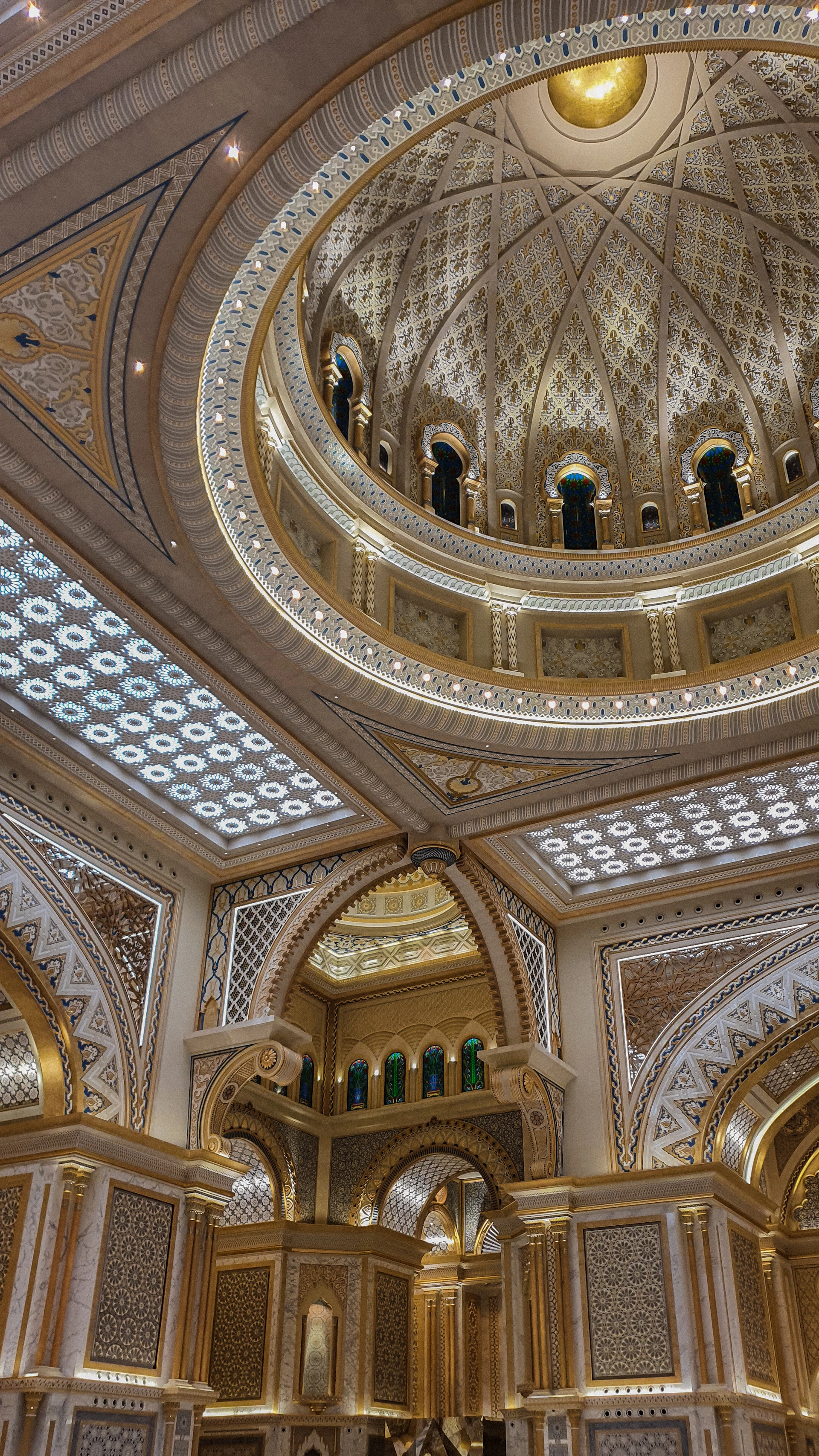 a large ornate ceiling with statues