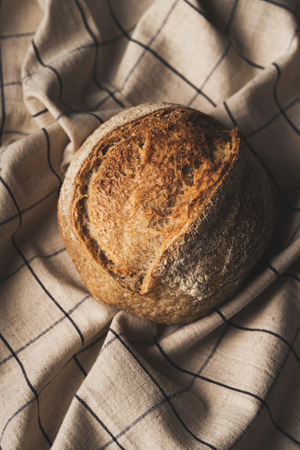 a loaf of bread on a cloth