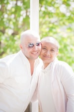 a man and woman smiling