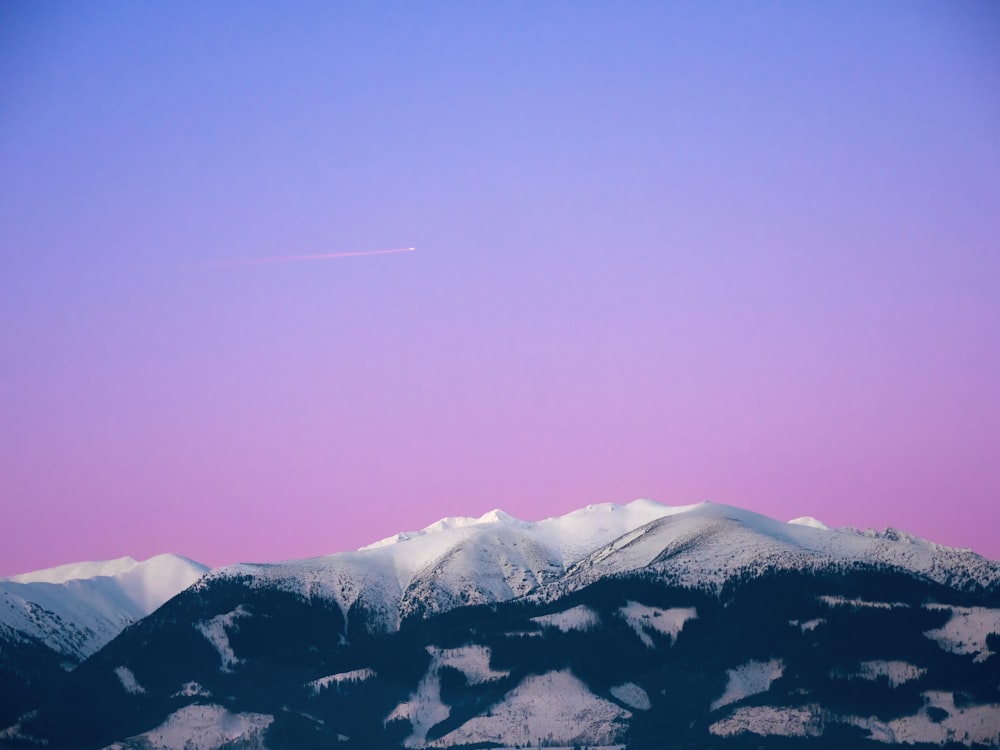 a view of a snow covered mountain