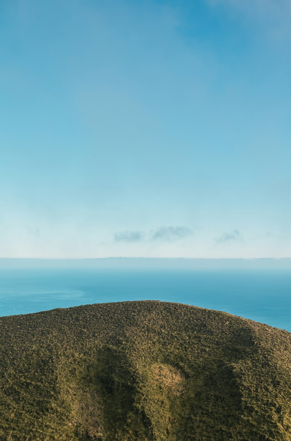 a rocky cliff overlooking the ocean