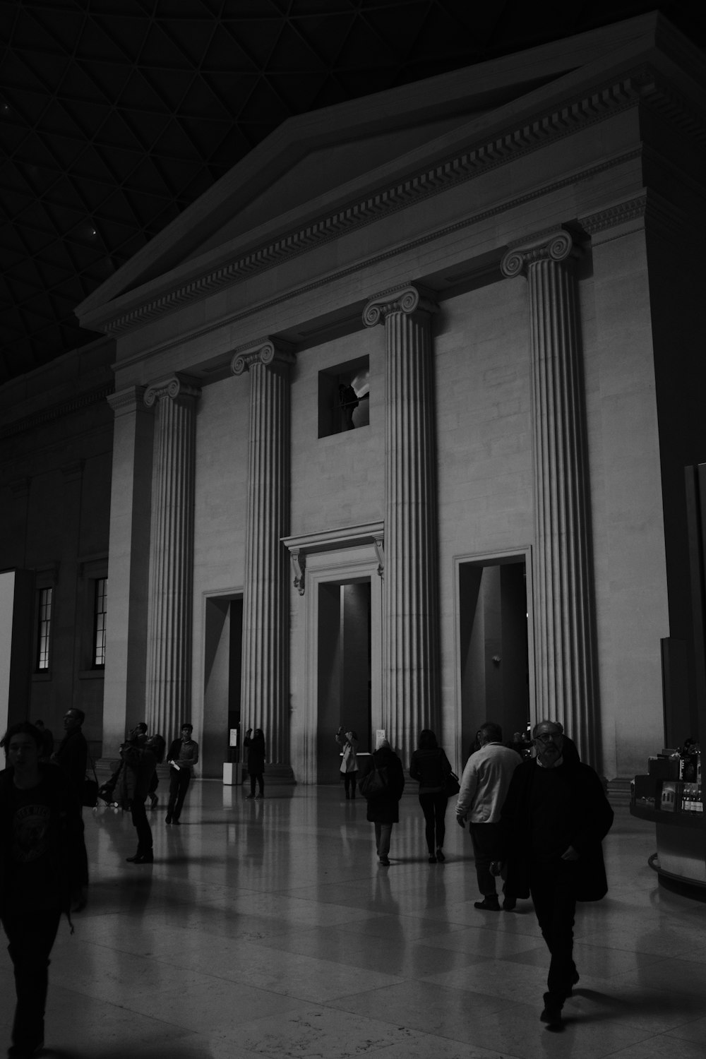 people walking in a building