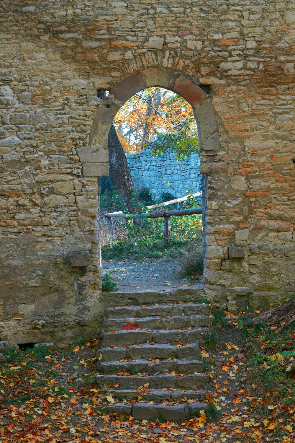 a stone staircase leading to a door