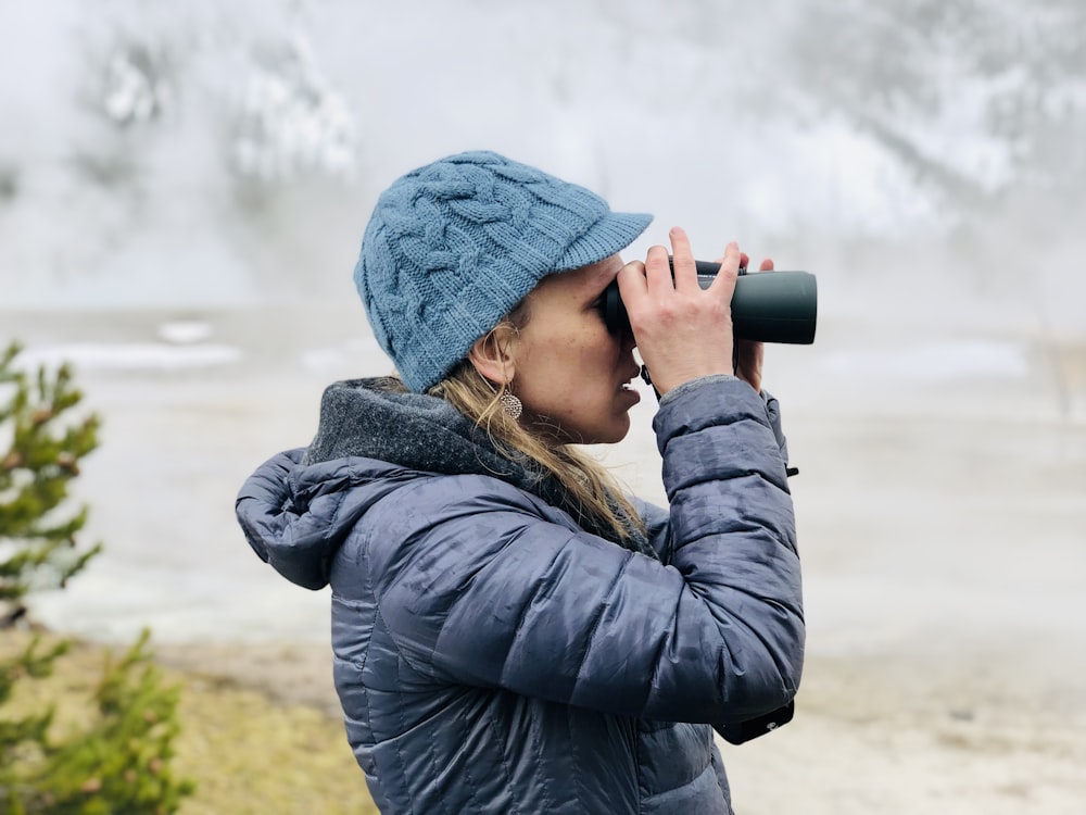 a person holding a camera