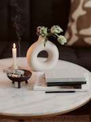 a vase with flowers on a table