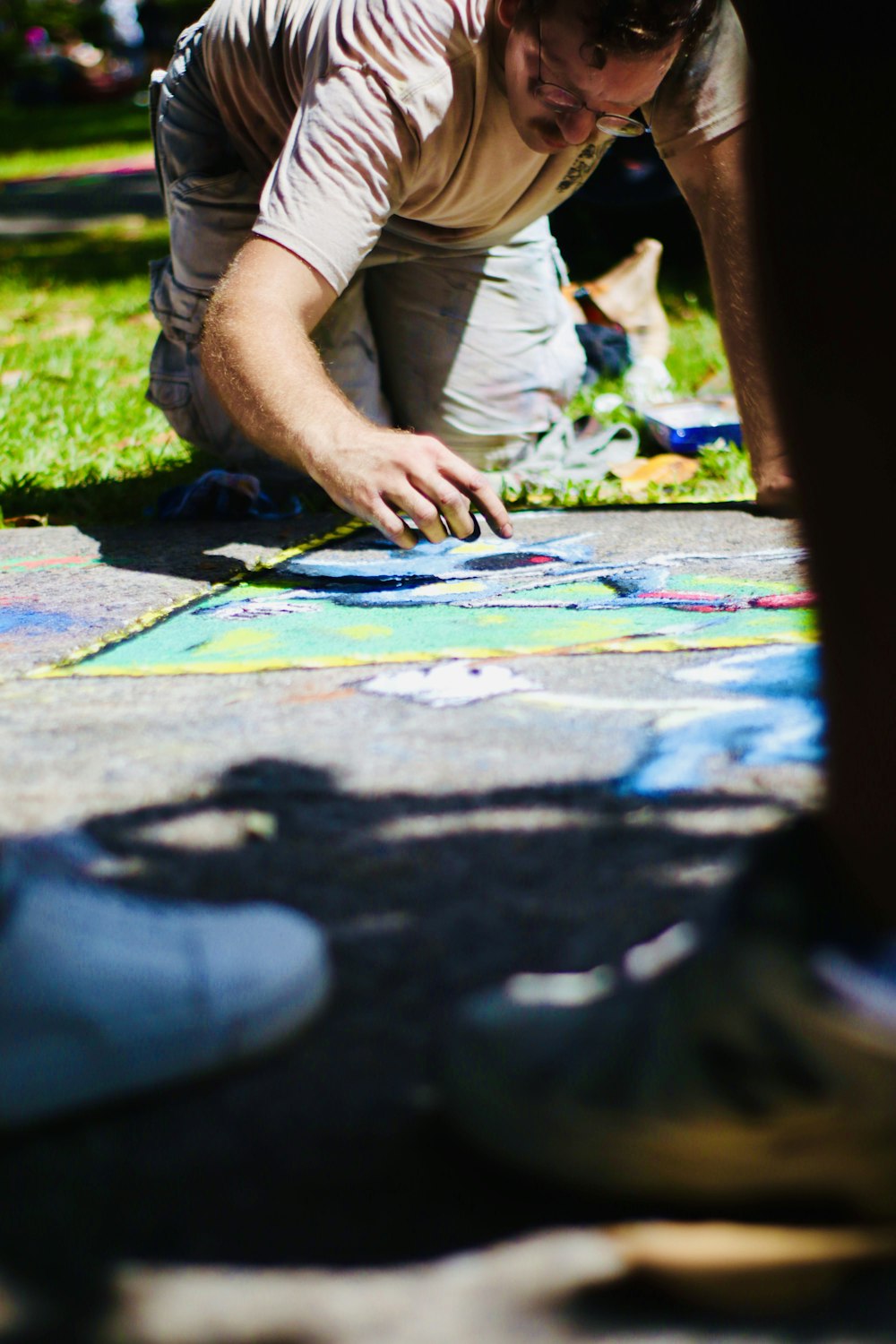 a man painting a picture