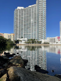 a large building next to a body of water