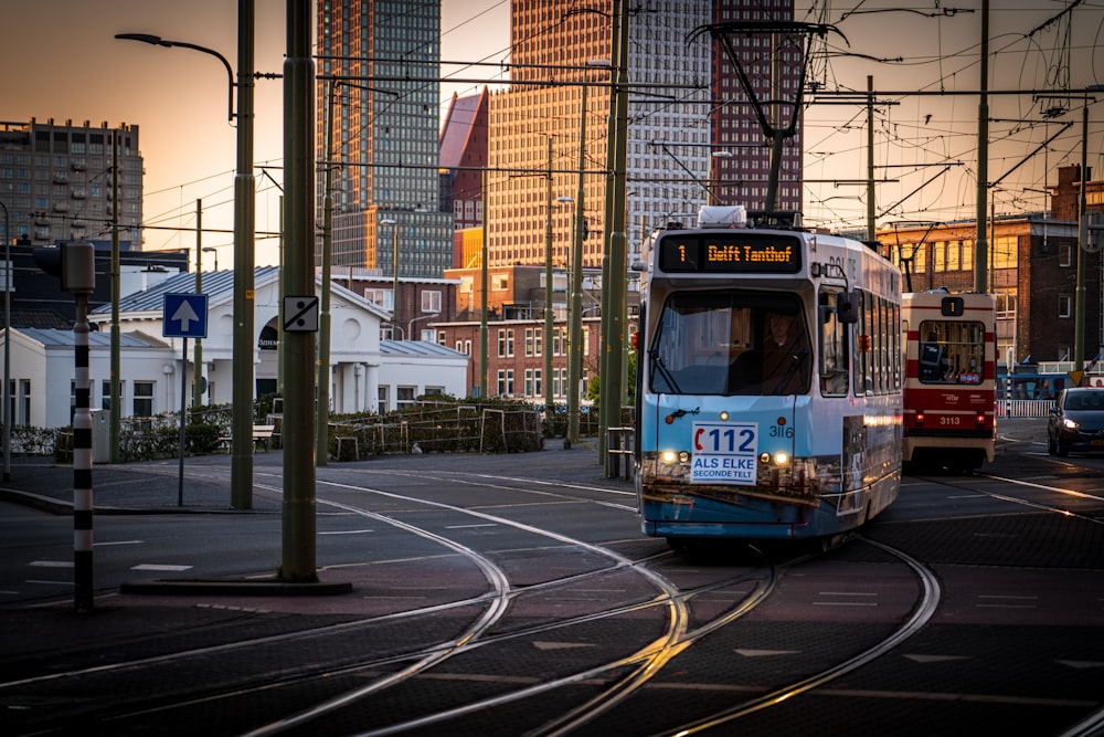 a couple of buses on a street