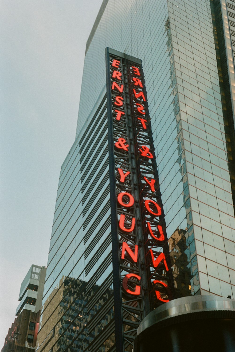 a tall building with a sign on it