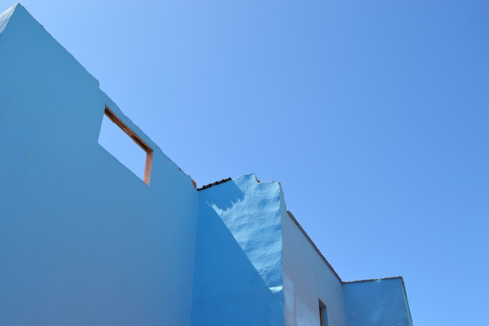 a white building with a blue sky