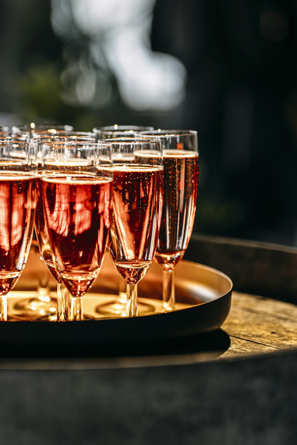 a group of glasses with liquid in them