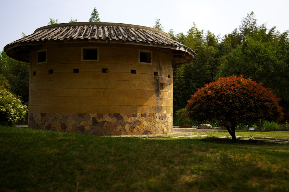 a building with a grass lawn