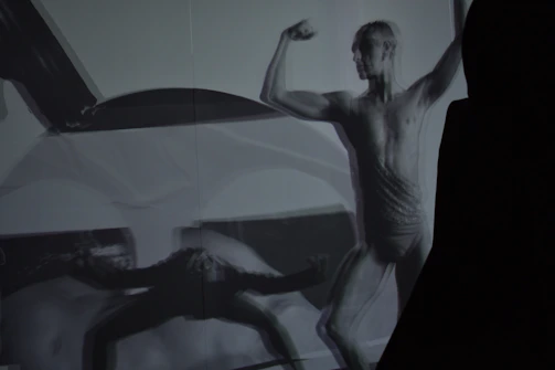 Bold black and white image of a fitness influencer promoting a nutrition brand.