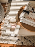 A cozy living space featuring a textured jute area rug under a low coffee table.