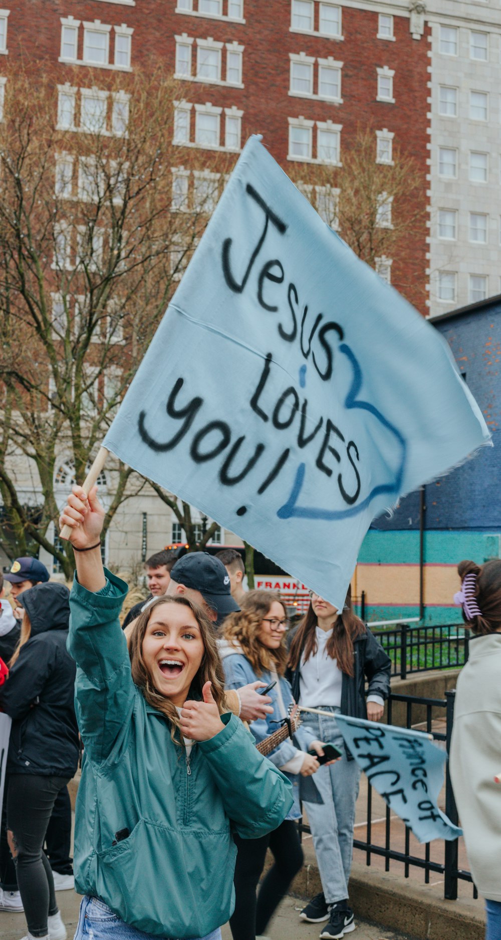 a person holding a sign