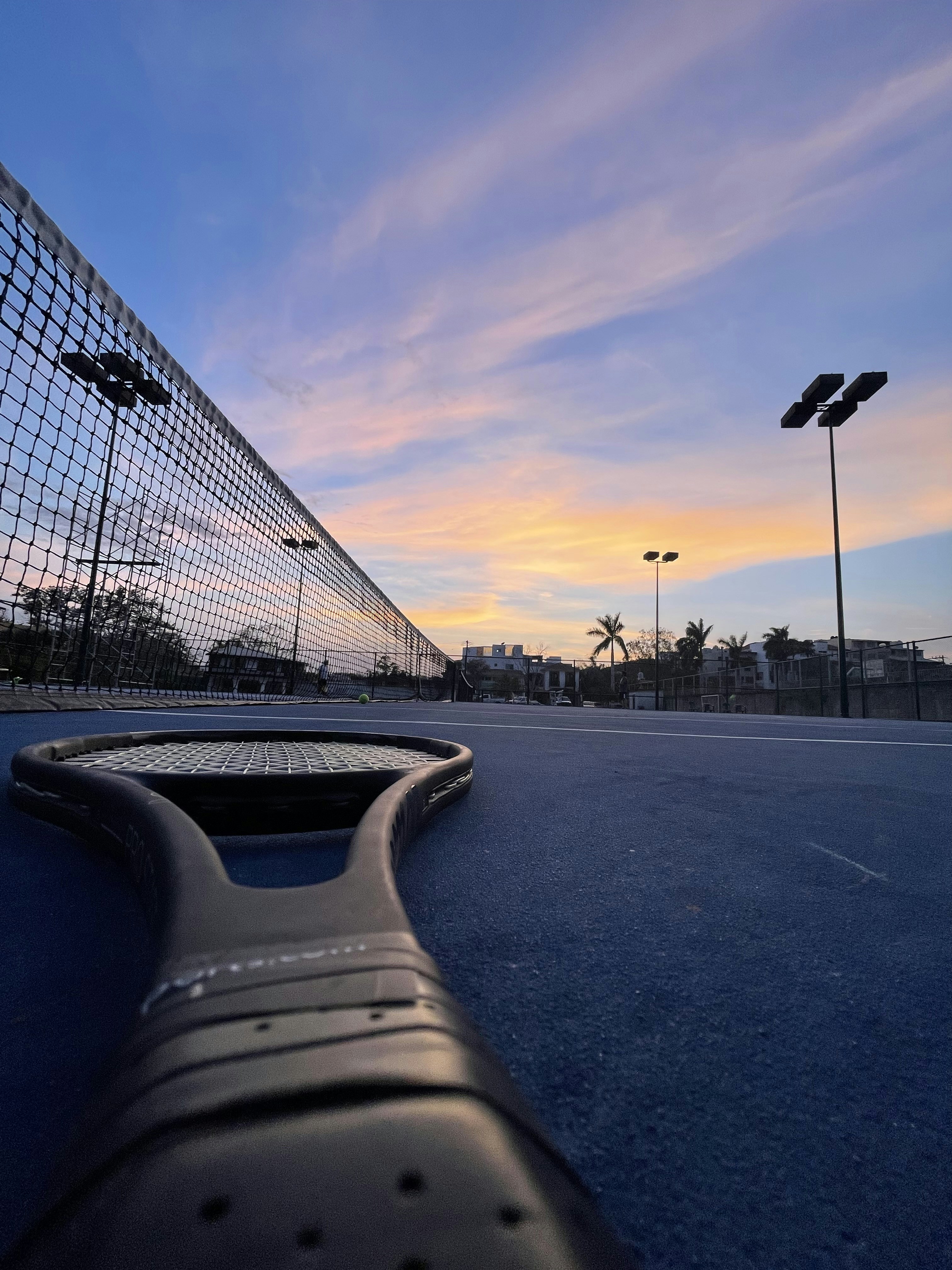 a bridge with a sunset