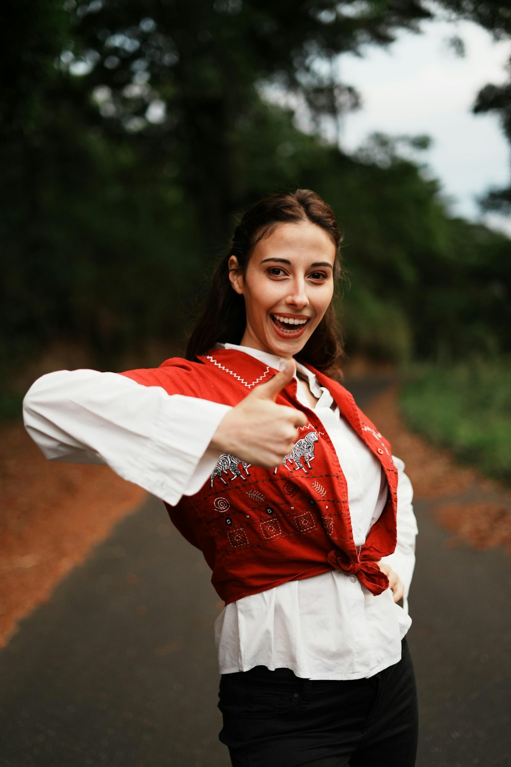 a person smiling and pointing