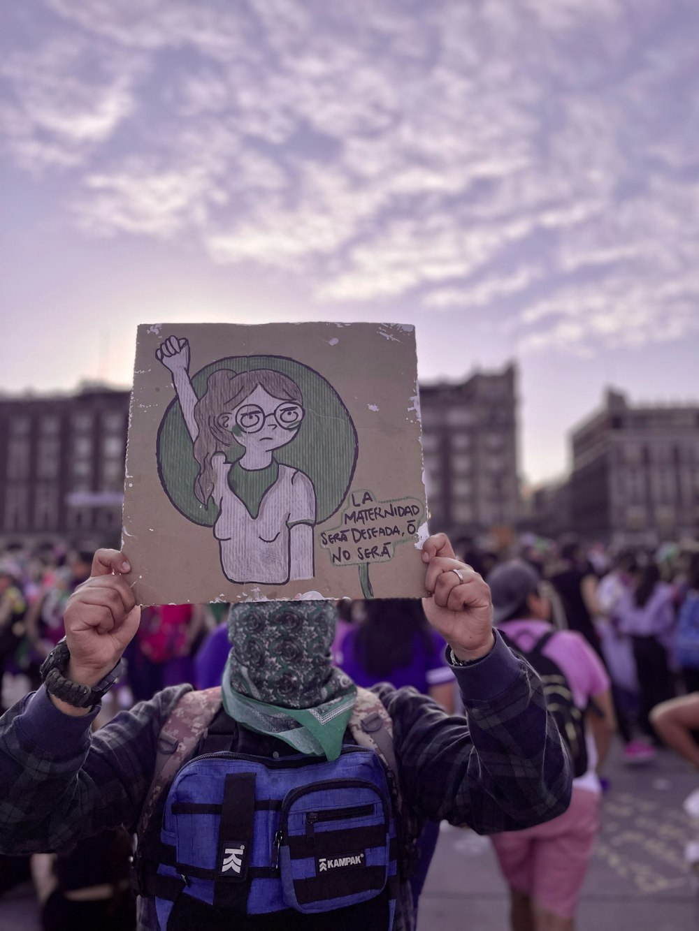 a person holding a sign