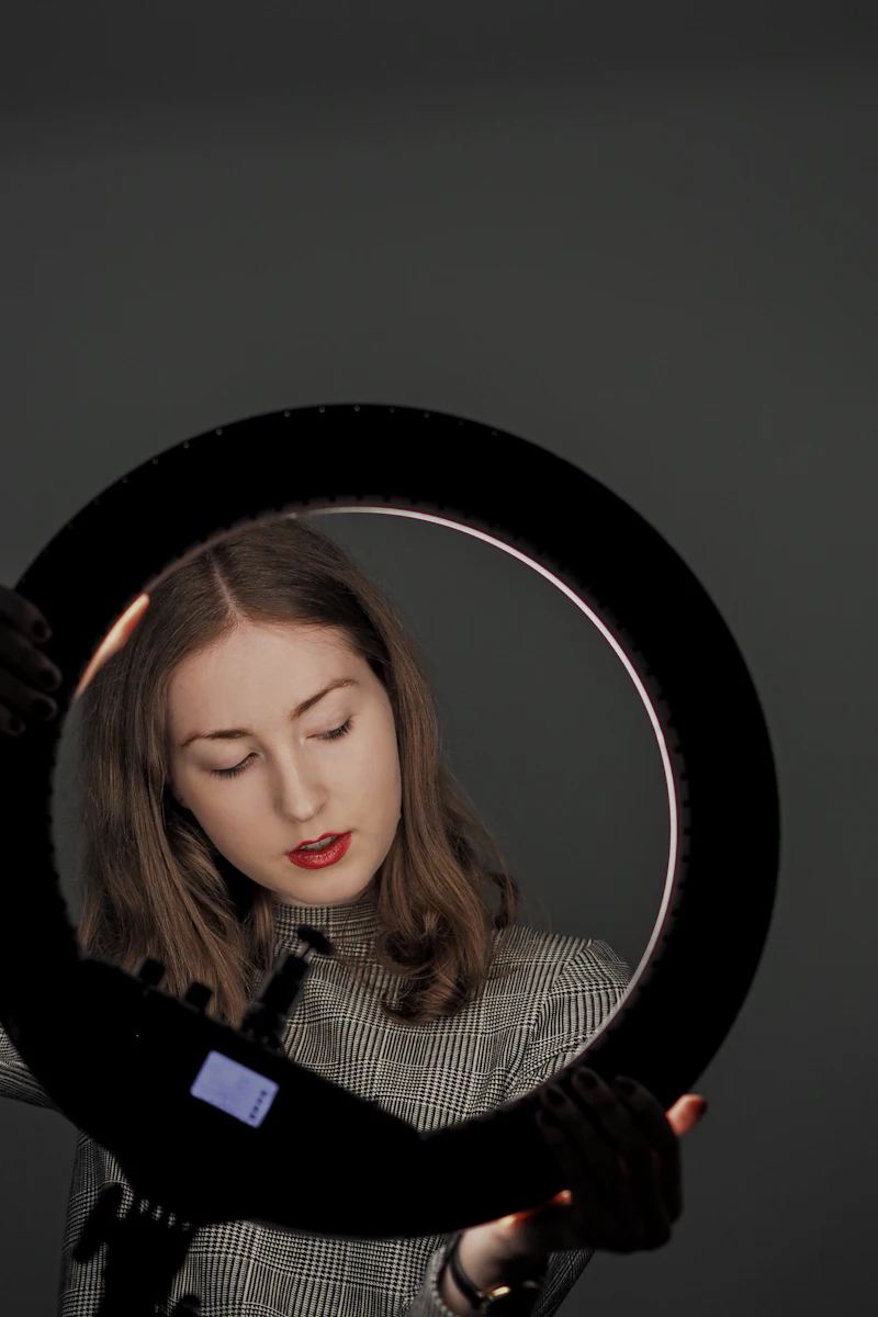 A creator lit by a ring light