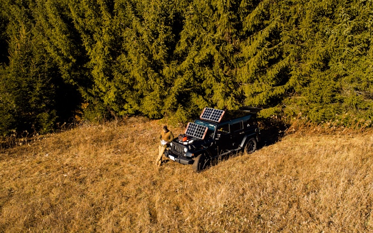 a man with portable cheap solar power kits.