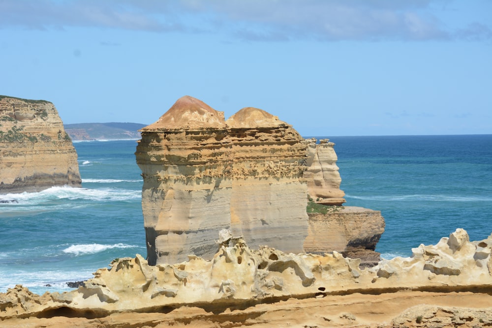 a rock formation on a beach