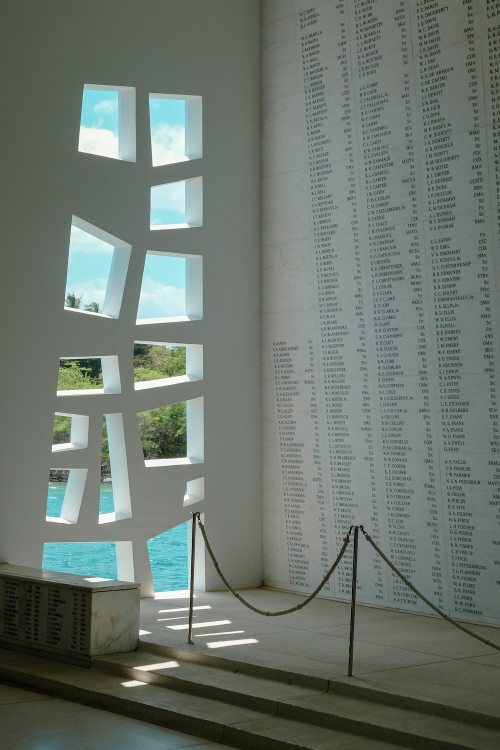 a room with a window and curtains