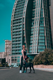 a man sitting on a dog