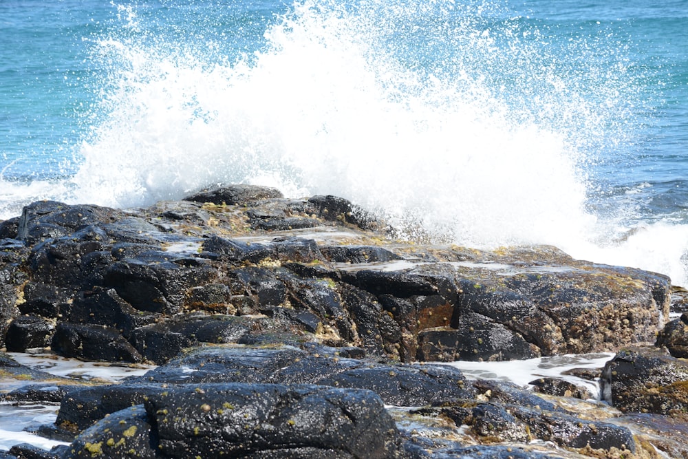 waves crashing on rocks