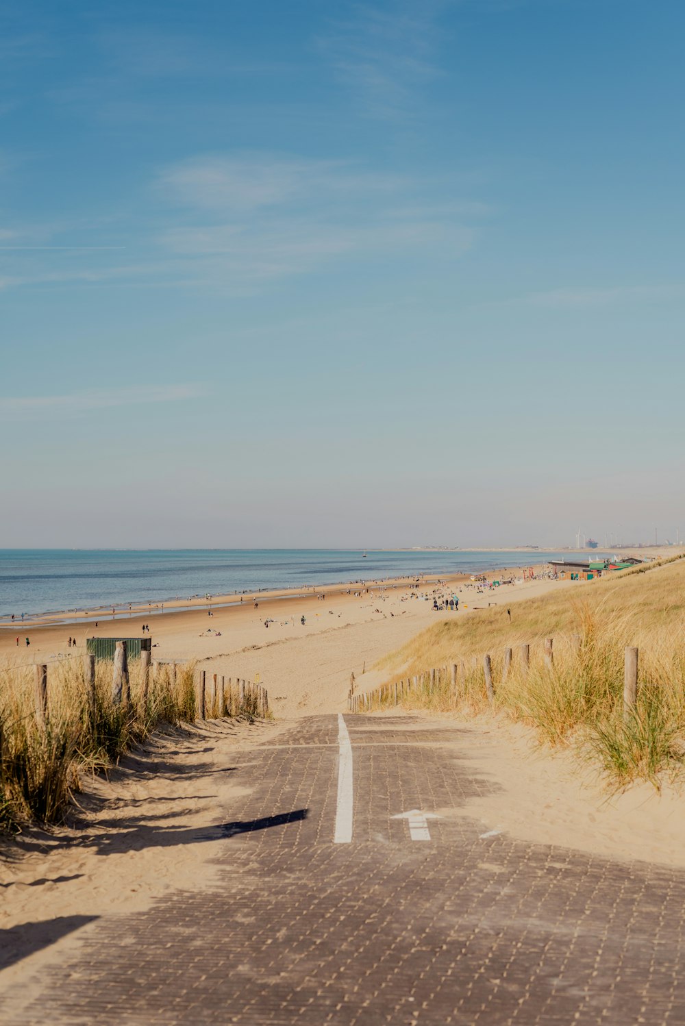 a road next to a beach