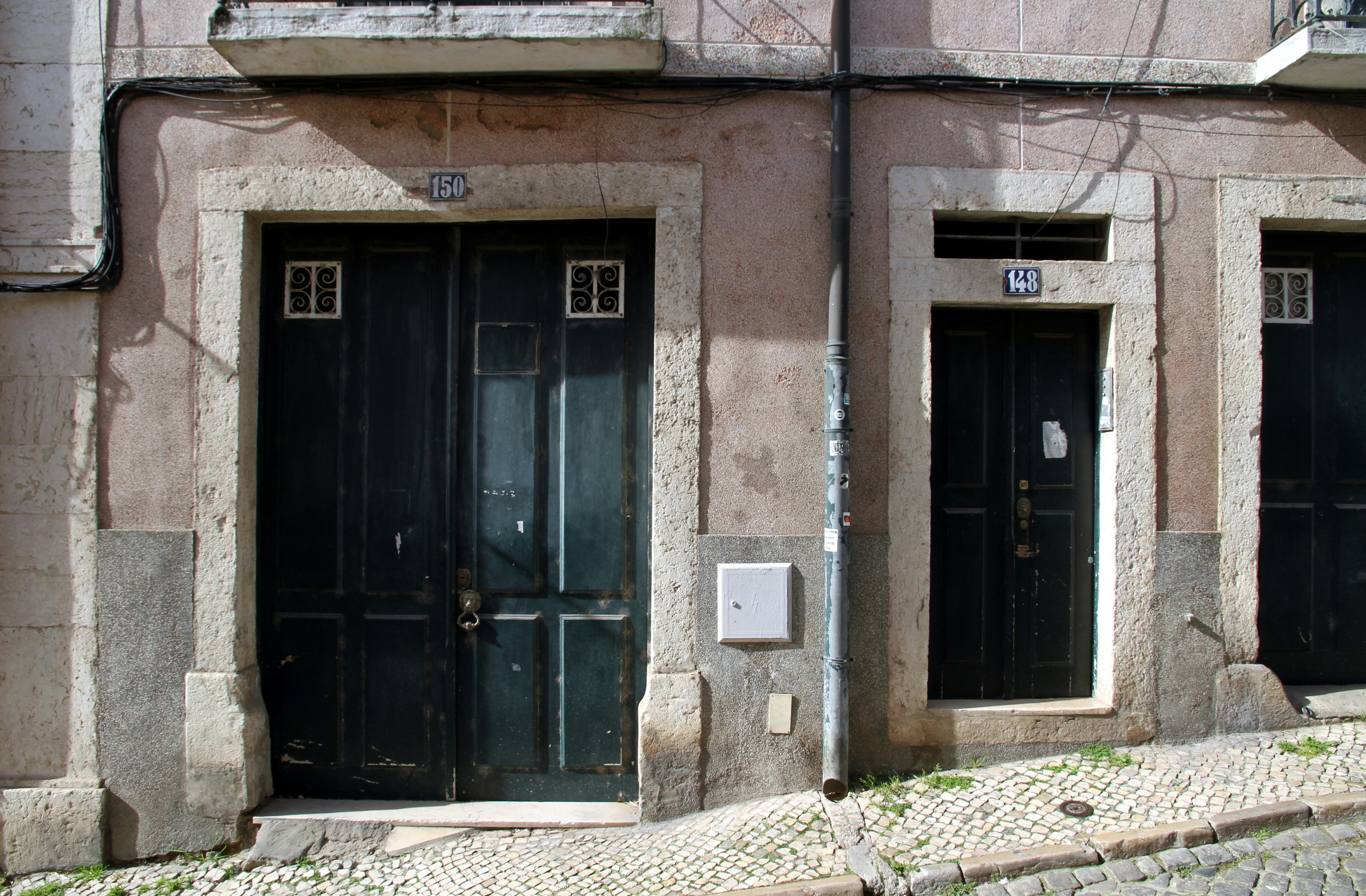 a building with black doors