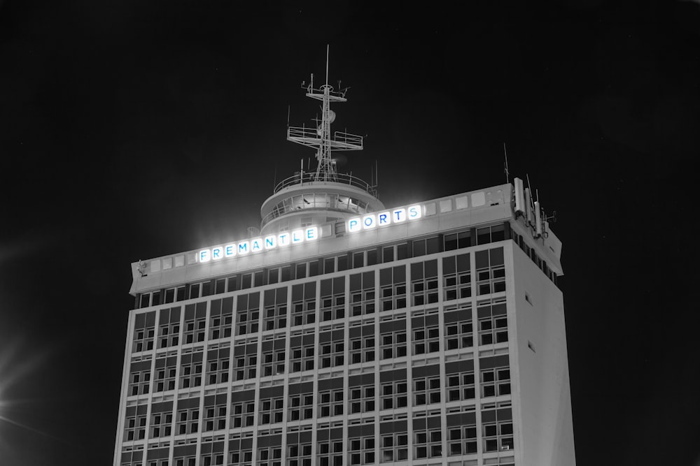 a tall building with lights at night