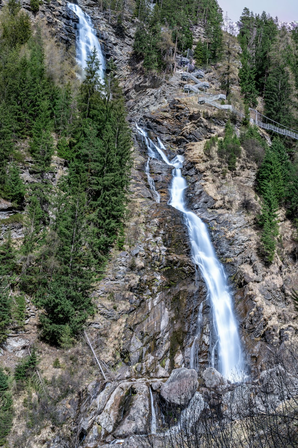 a waterfall in a forest