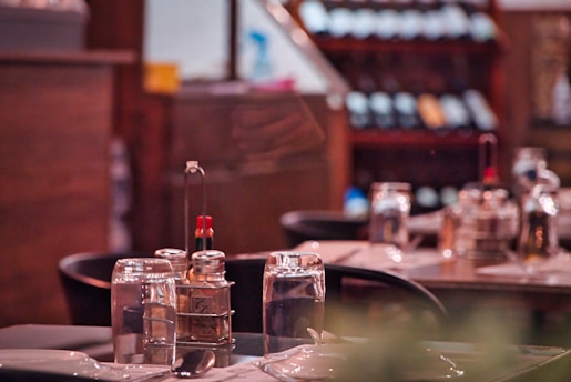 a table with glasses and bottles on it
