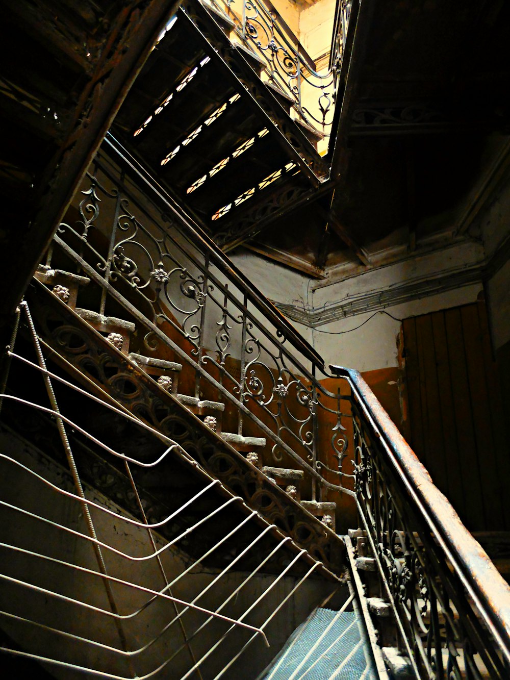 a staircase with metal railings