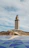 a tall tower with a blue sky
