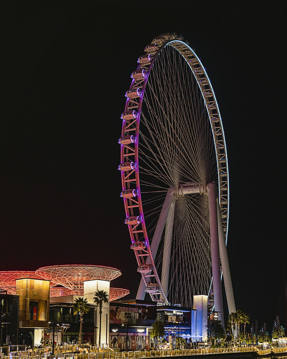 a ferris wheel at night