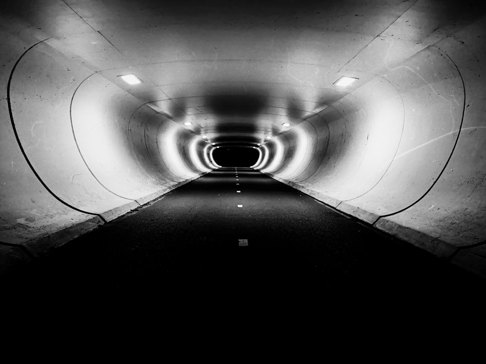a black and white photo of a tunnel