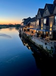 a row of houses on a river