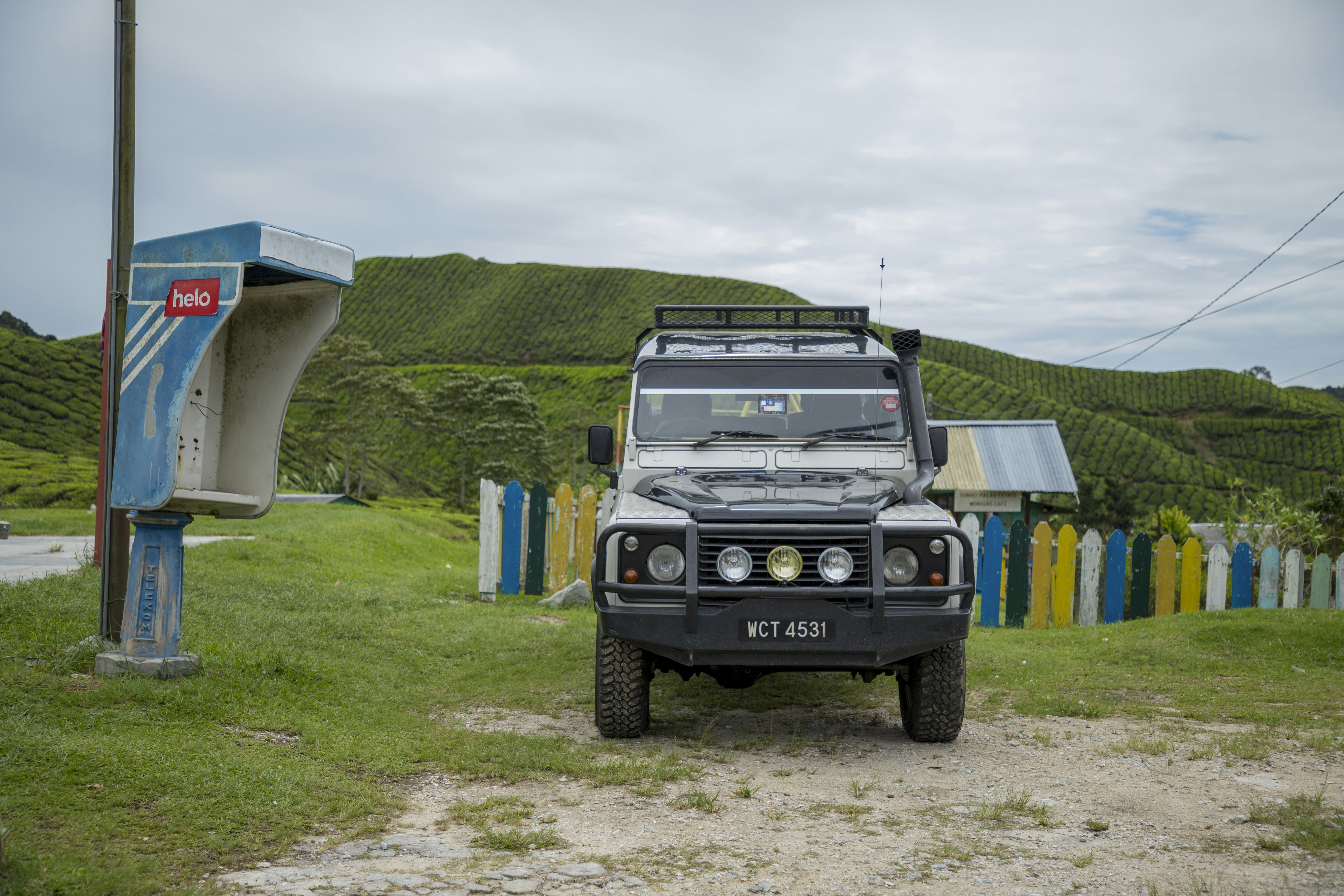 a jeep parked on grass