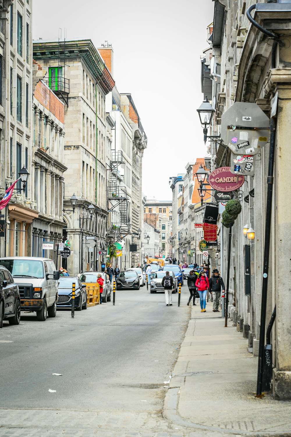 a busy street with people and cars