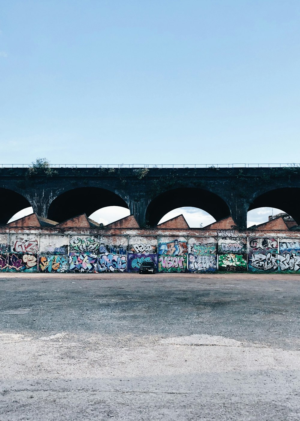 a bridge with graffiti