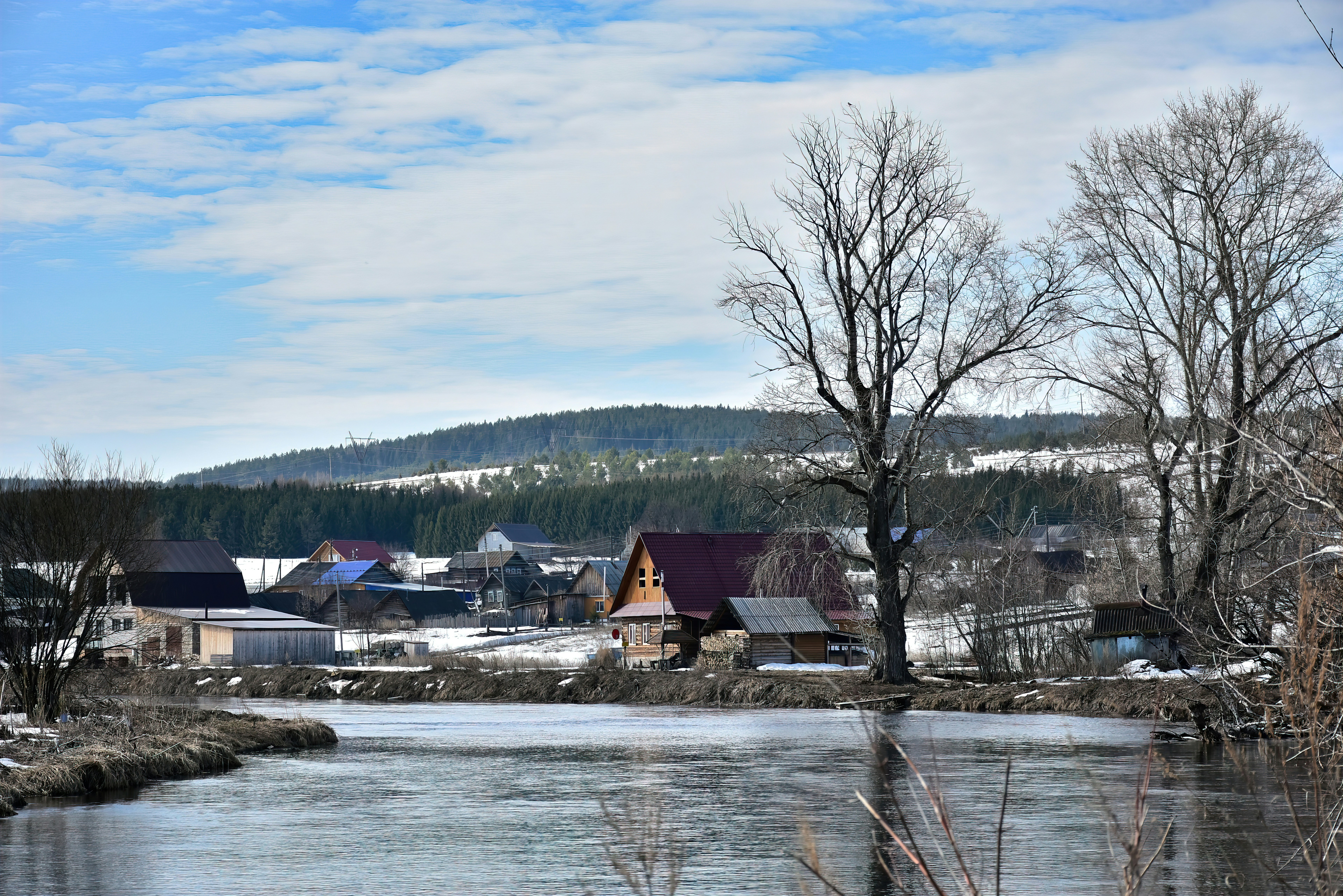a body of water with houses along it