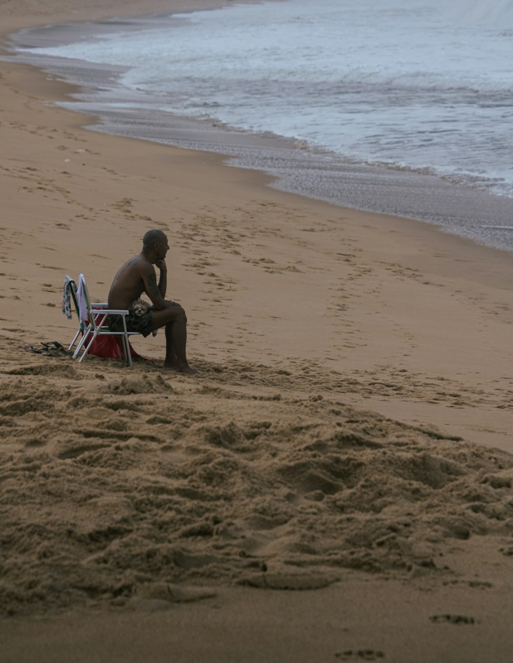 a person sitting on a beach