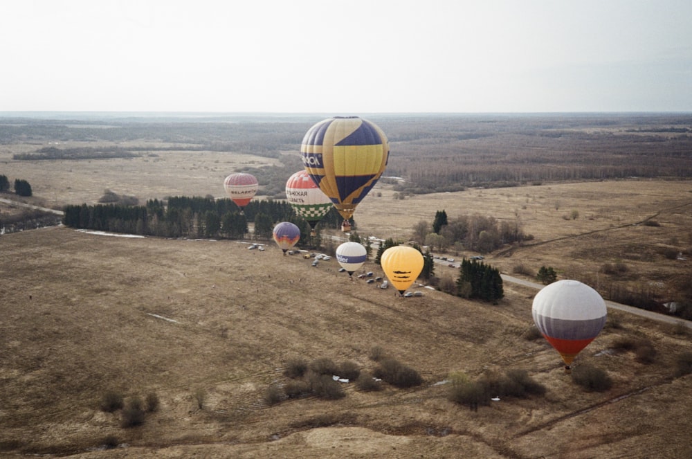 a group of hot air balloons in the air