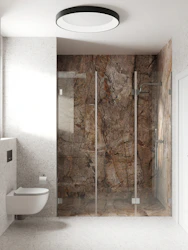 a bathroom with a shower unit