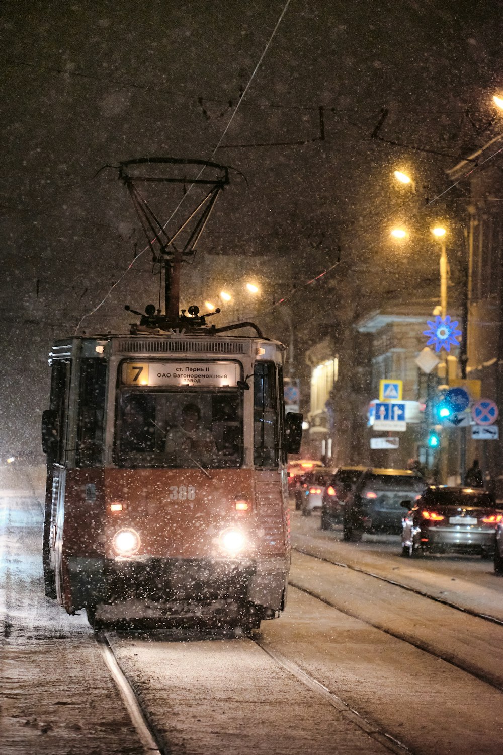 a trolley on a street at night