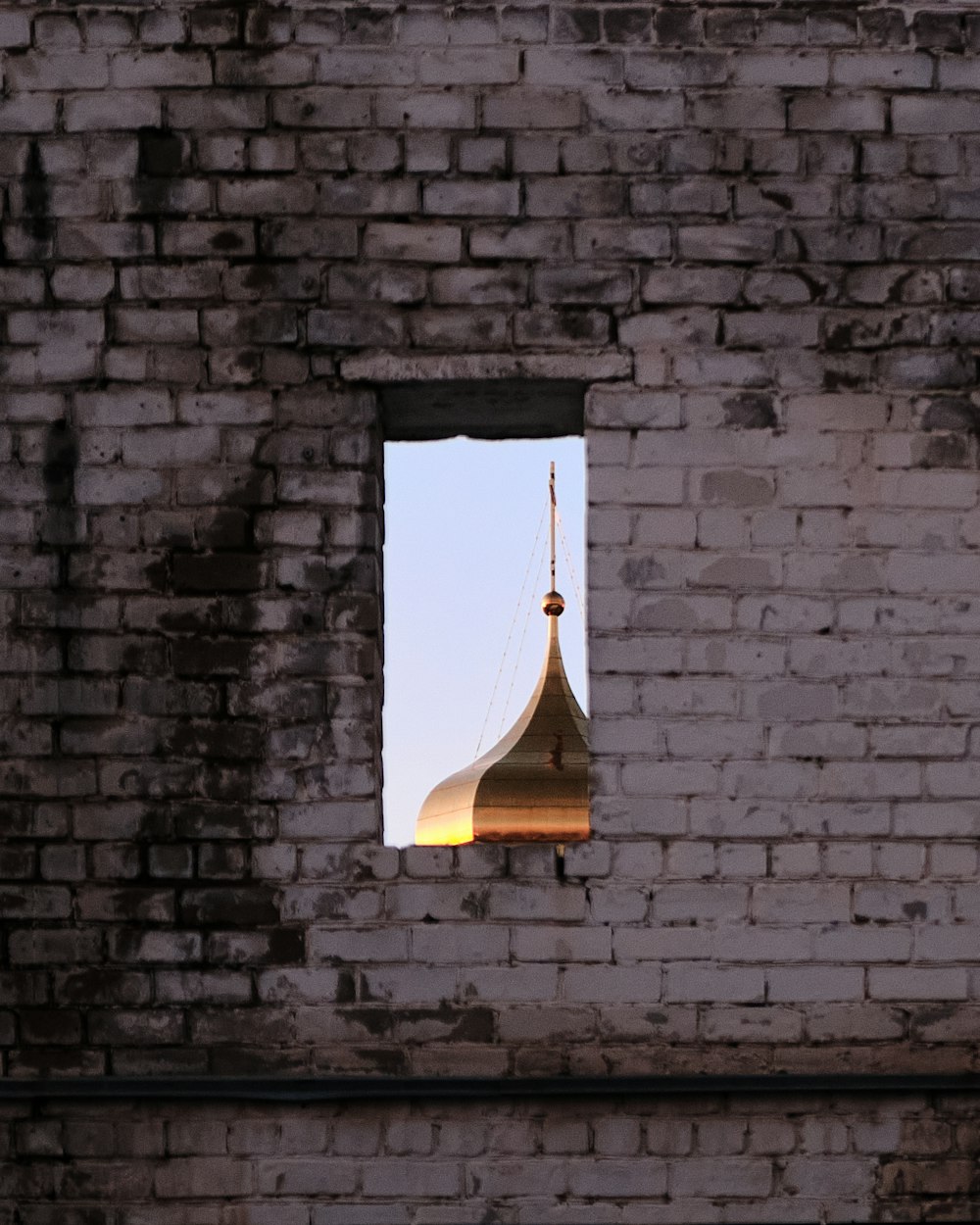 a window in a brick building