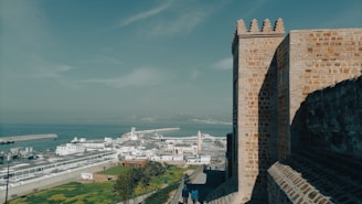 a large stone tower overlooking a city