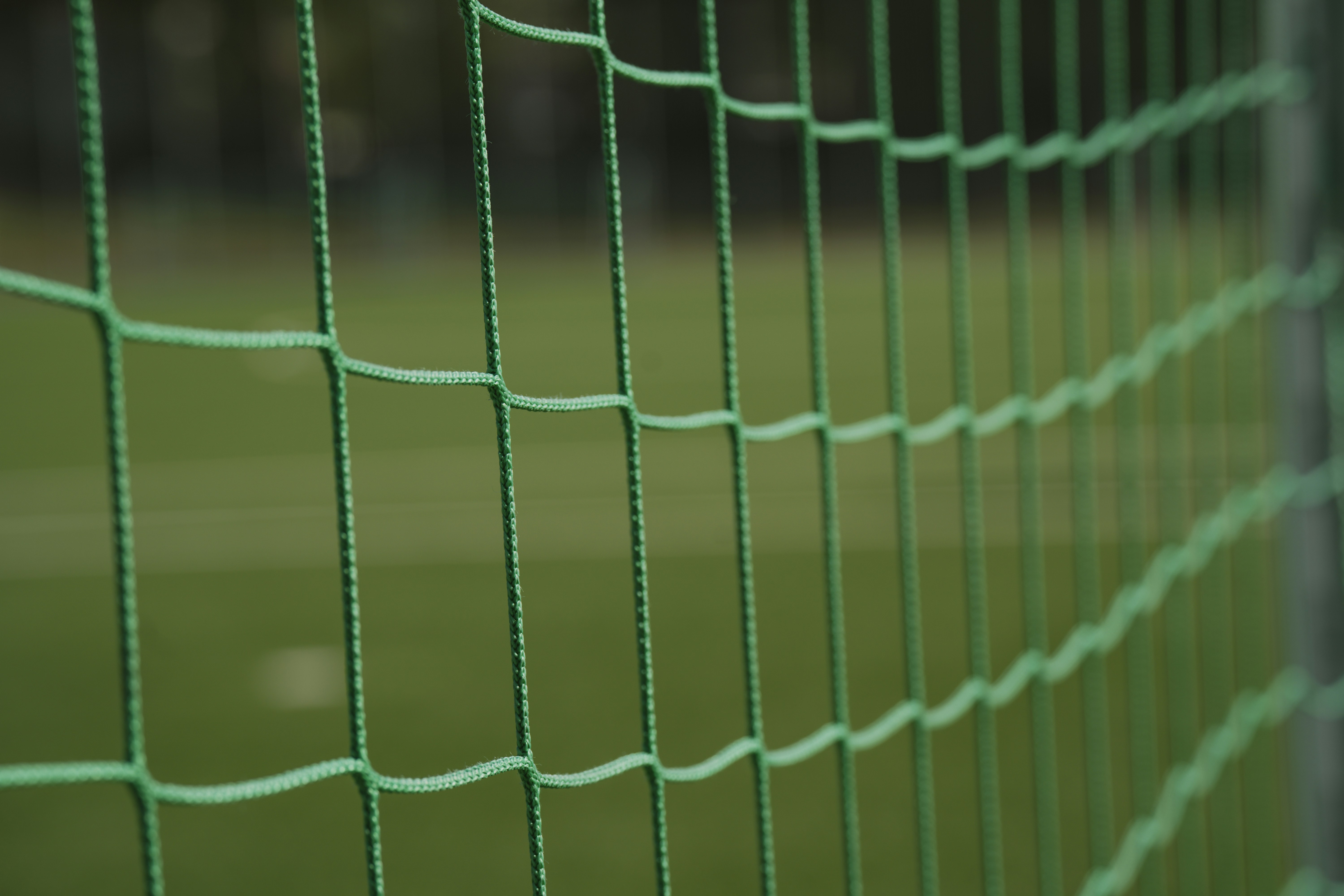 A net of a soccer goal with a blurry background. ⚽️